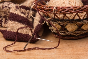 knitting needles and basket