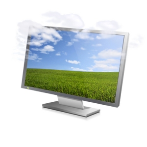 Clouds vanishing from a landscape displayed on a computer monitor